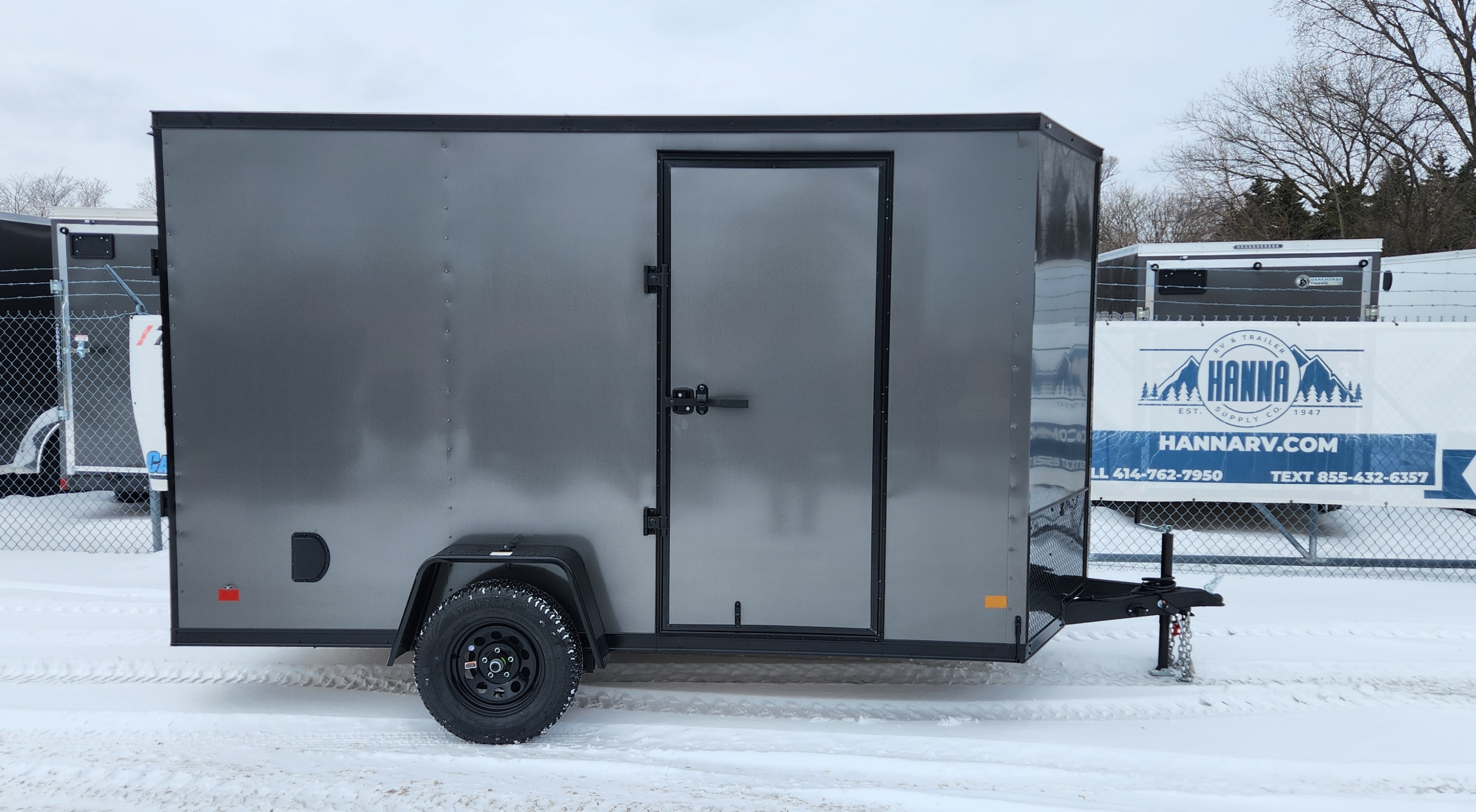 DarkHorse 6.5X12 Wedge Nose Single Axle Steel Cargo Trailer with Ramp Door, 12" Extra Height - 2500 Series - Charcoal with Blackout Package